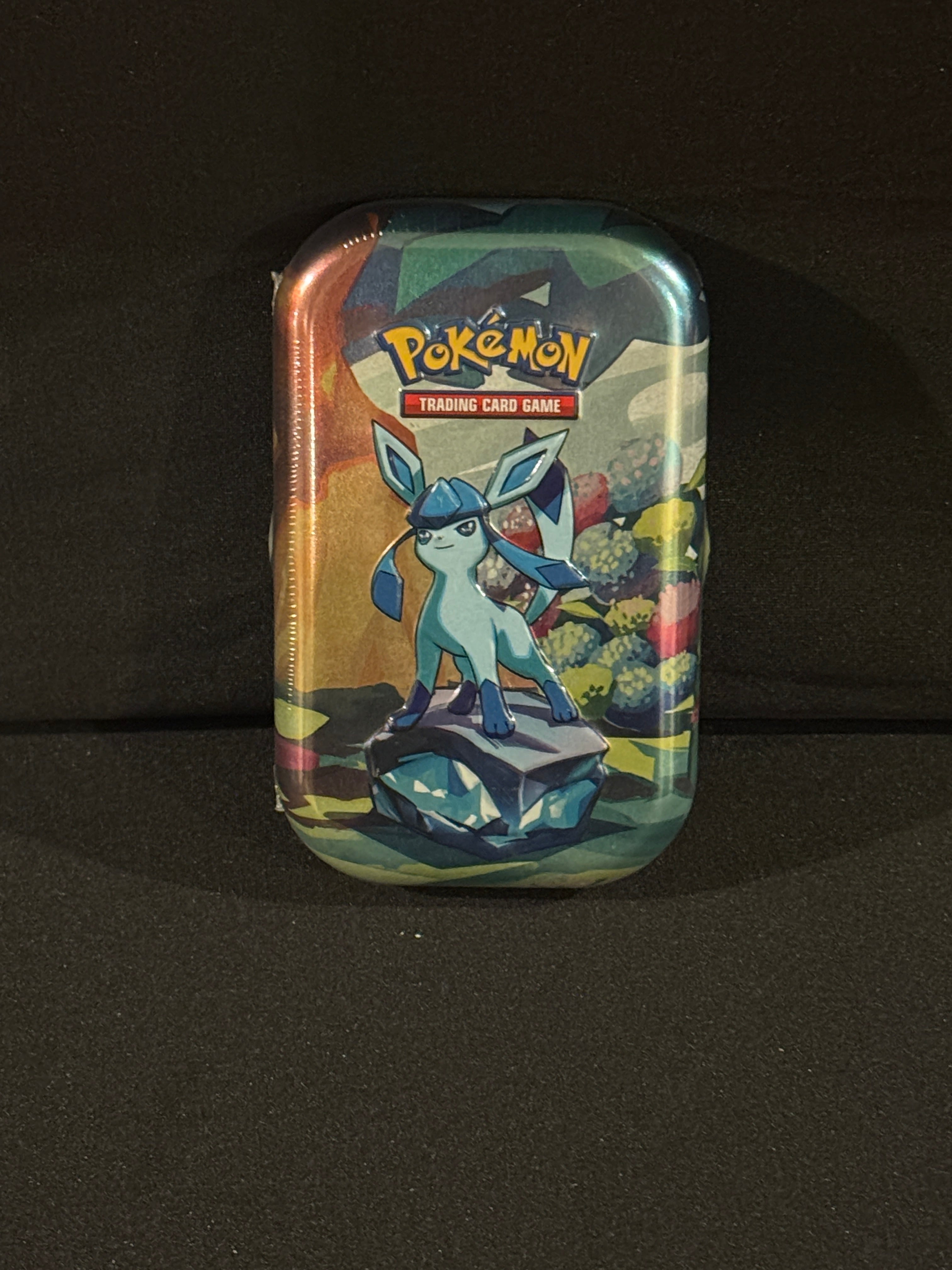 Prismatic Evolution Mini Tin
